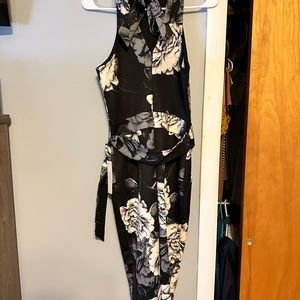 Venus black halter tie form fitting midi dress. Size small.